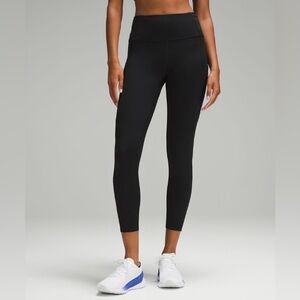 black Lululemon Fast and Free High-Rise Athletic Leggings, likely the 25" sz 2